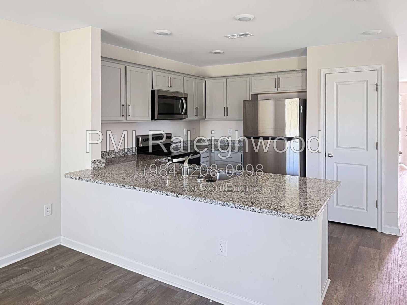 Modern & Stylish Corner Unit 3BR Corner Townhome with Garage, Kitchen Island, Luxury Primary Suite, Smart Home Features, backyard & Open-Concept Living property image