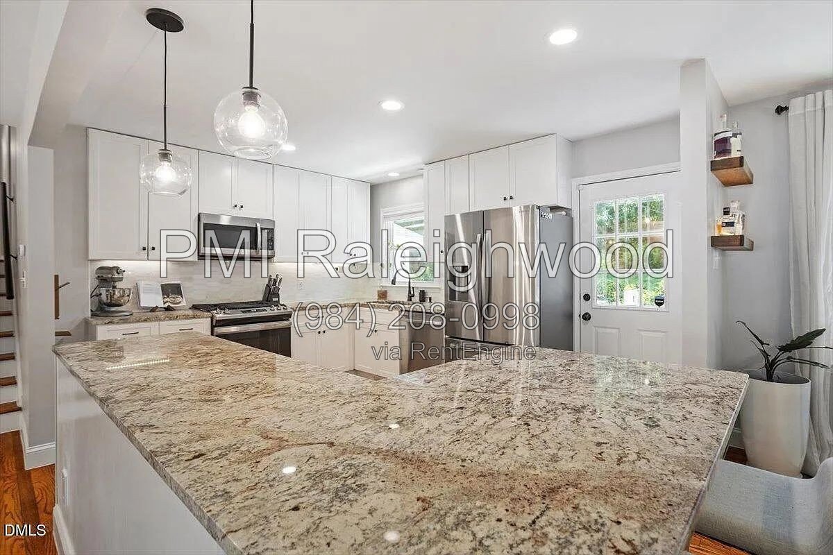 North Hills / Midtown Raleigh – Updated 3BR/2.5BA Home with Fenced Backyard & Multiple Living Spaces property image