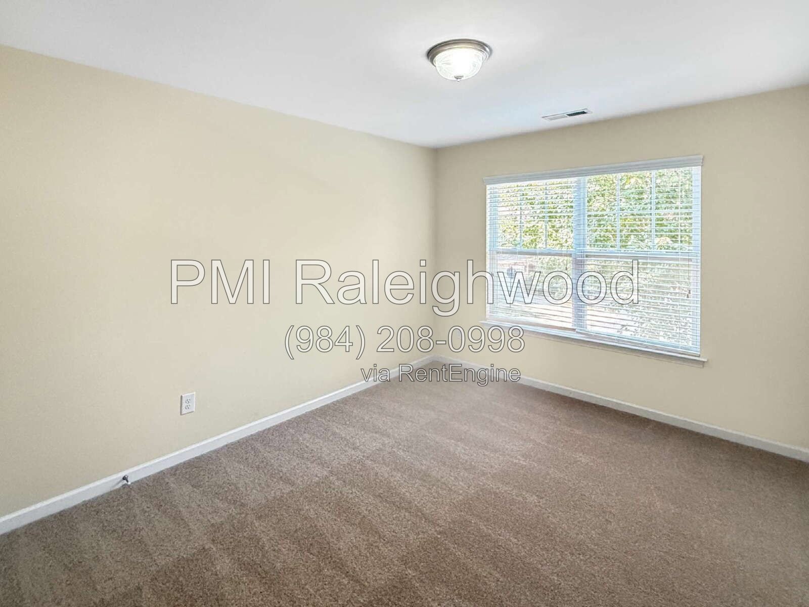 Spacious 3BR Townhome for Rent in Silver Lake Bluffs | Screened Porch, Fresh Paint and New Carpet, Pool, Lake, Fireplace & Convenient Raleigh Location property image